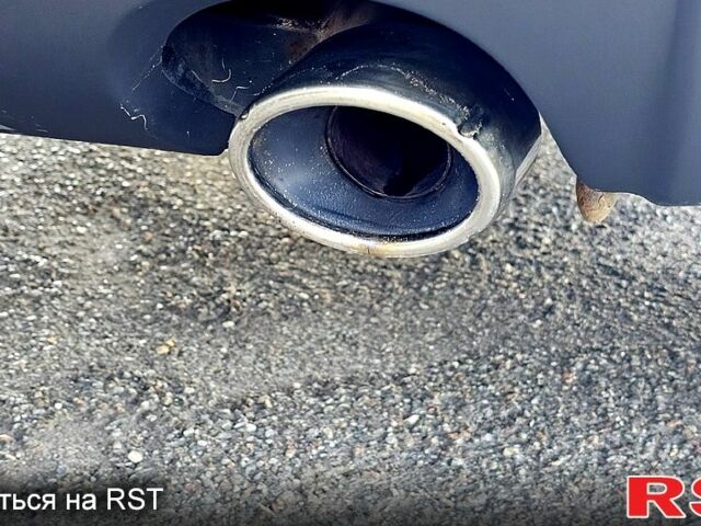 Черный Хендай Туксон, объемом двигателя 2 л и пробегом 215 тыс. км за 8350 $, фото 5 на Automoto.ua