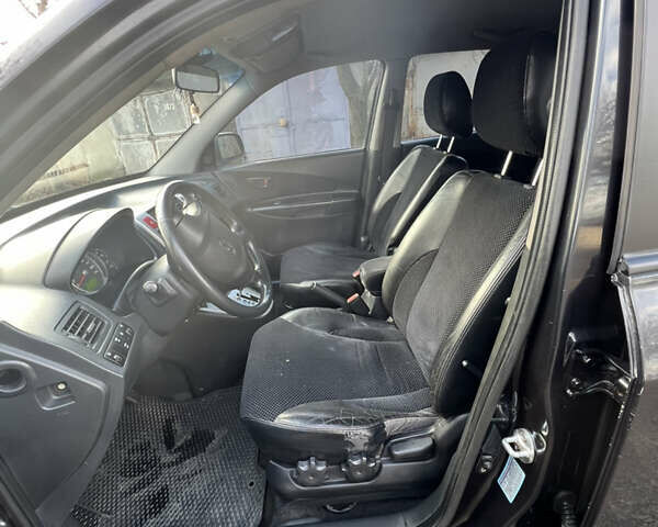 Чорний Хендай Туксон, об'ємом двигуна 2 л та пробігом 240 тис. км за 8500 $, фото 15 на Automoto.ua