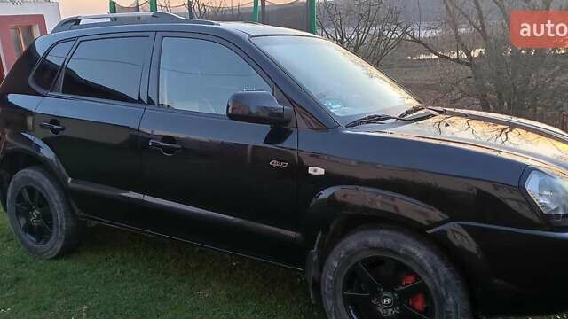 Черный Хендай Туксон, объемом двигателя 1.99 л и пробегом 203 тыс. км за 8000 $, фото 1 на Automoto.ua
