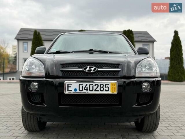 Черный Хендай Туксон, объемом двигателя 1.98 л и пробегом 239 тыс. км за 8700 $, фото 9 на Automoto.ua