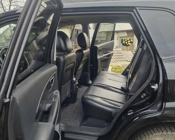 Чорний Хендай Туксон, об'ємом двигуна 1.99 л та пробігом 181 тис. км за 8150 $, фото 9 на Automoto.ua