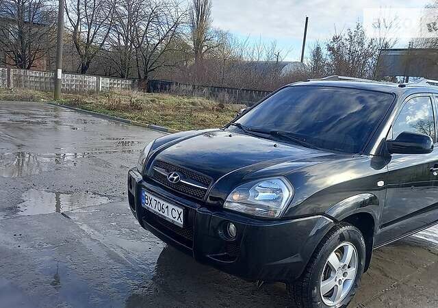 Чорний Хендай Туксон, об'ємом двигуна 2 л та пробігом 270 тис. км за 7300 $, фото 11 на Automoto.ua