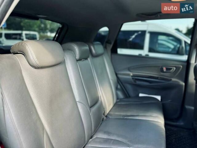 Черный Хендай Туксон, объемом двигателя 1.98 л и пробегом 206 тыс. км за 8300 $, фото 7 на Automoto.ua