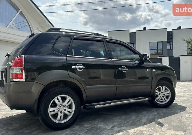 Черный Хендай Туксон, объемом двигателя 2 л и пробегом 67 тыс. км за 9999 $, фото 59 на Automoto.ua