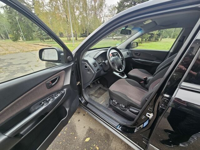 Чорний Хендай Туксон, об'ємом двигуна 2 л та пробігом 186 тис. км за 8300 $, фото 10 на Automoto.ua