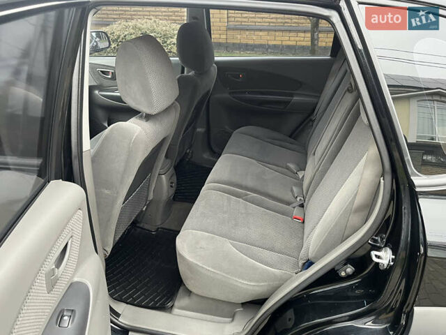 Черный Хендай Туксон, объемом двигателя 2 л и пробегом 107 тыс. км за 8900 $, фото 26 на Automoto.ua