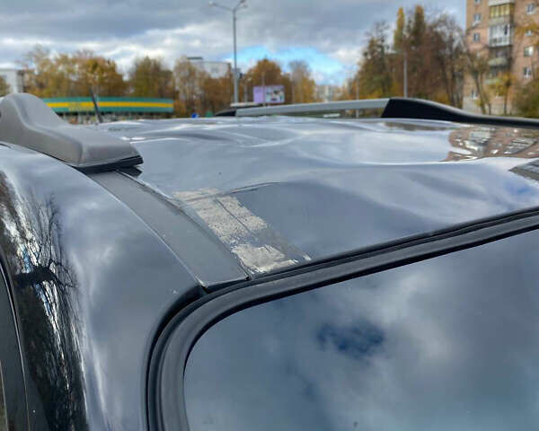 Чорний Хендай Туксон, об'ємом двигуна 1.98 л та пробігом 116 тис. км за 5500 $, фото 8 на Automoto.ua