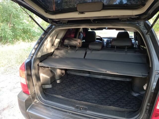 Чорний Хендай Туксон, об'ємом двигуна 2 л та пробігом 270 тис. км за 8000 $, фото 6 на Automoto.ua