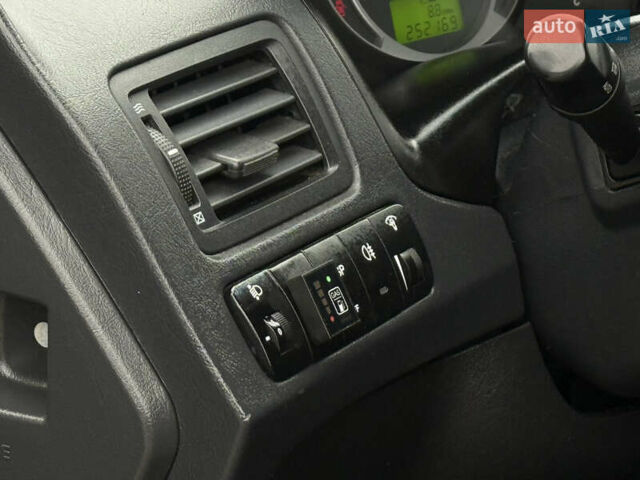 Черный Хендай Туксон, объемом двигателя 2 л и пробегом 252 тыс. км за 7200 $, фото 14 на Automoto.ua