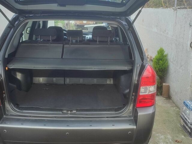 Чорний Хендай Туксон, об'ємом двигуна 2 л та пробігом 214 тис. км за 6000 $, фото 6 на Automoto.ua