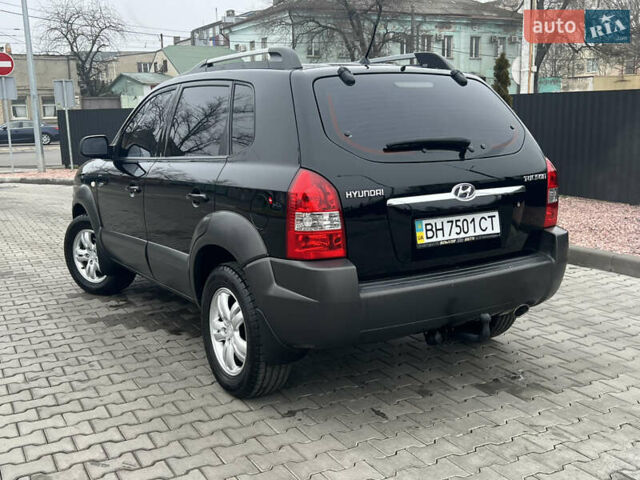 Черный Хендай Туксон, объемом двигателя 2 л и пробегом 137 тыс. км за 9500 $, фото 13 на Automoto.ua
