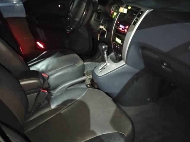 Чорний Хендай Туксон, об'ємом двигуна 2 л та пробігом 226 тис. км за 4742 $, фото 1 на Automoto.ua