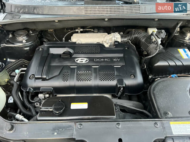 Черный Хендай Туксон, объемом двигателя 2 л и пробегом 276 тыс. км за 7450 $, фото 23 на Automoto.ua