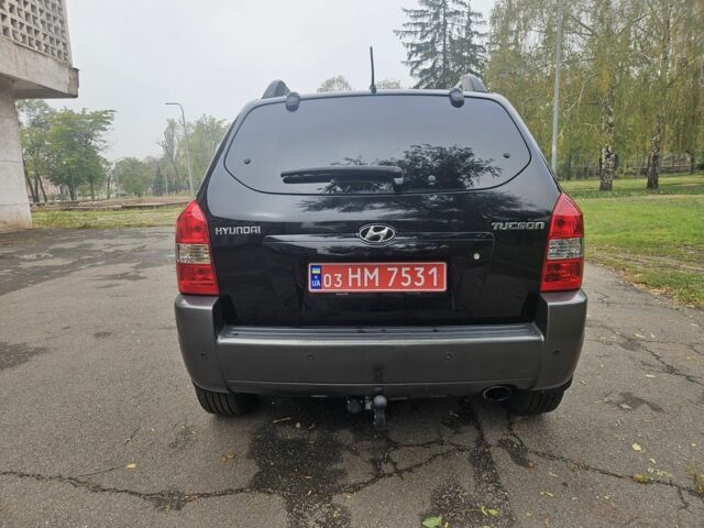Чорний Хендай Туксон, об'ємом двигуна 2 л та пробігом 186 тис. км за 8300 $, фото 7 на Automoto.ua