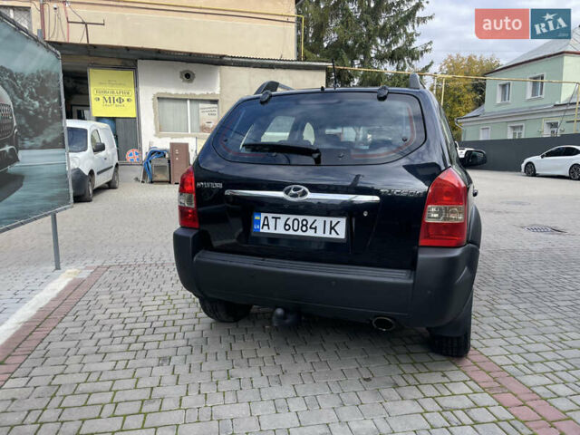 Черный Хендай Туксон, объемом двигателя 1.98 л и пробегом 177 тыс. км за 7600 $, фото 10 на Automoto.ua