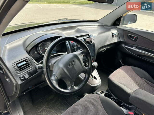 Чорний Хендай Туксон, об'ємом двигуна 1.98 л та пробігом 279 тис. км за 8200 $, фото 22 на Automoto.ua