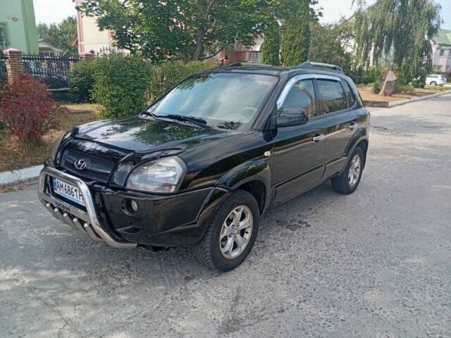 Чорний Хендай Туксон, об'ємом двигуна 2 л та пробігом 260 тис. км за 6750 $, фото 1 на Automoto.ua