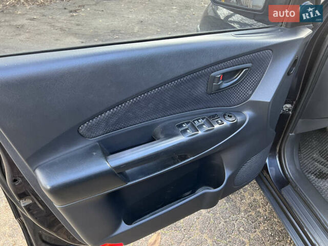 Чорний Хендай Туксон, об'ємом двигуна 2 л та пробігом 240 тис. км за 8500 $, фото 14 на Automoto.ua