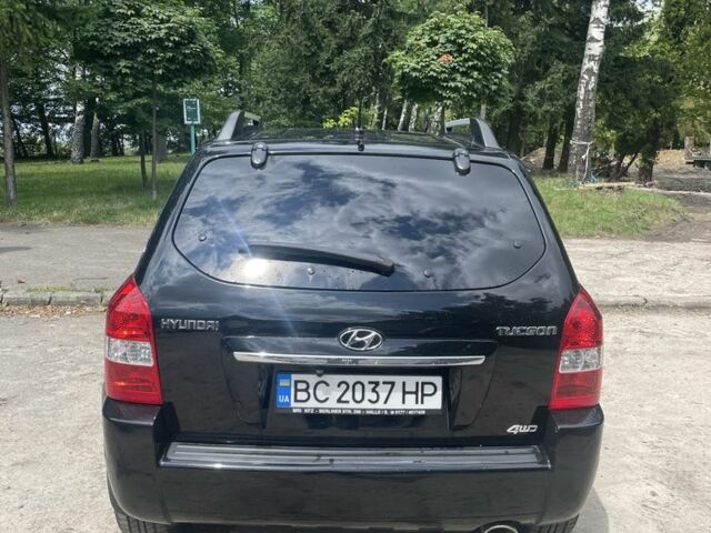 Черный Хендай Туксон, объемом двигателя 2 л и пробегом 171 тыс. км за 8500 $, фото 8 на Automoto.ua