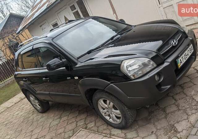 Черный Хендай Туксон, объемом двигателя 2 л и пробегом 163 тыс. км за 8100 $, фото 15 на Automoto.ua