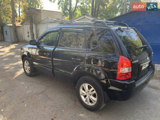 Черный Хендай Туксон, объемом двигателя 1.98 л и пробегом 260 тыс. км за 7777 $, фото 3 на Automoto.ua