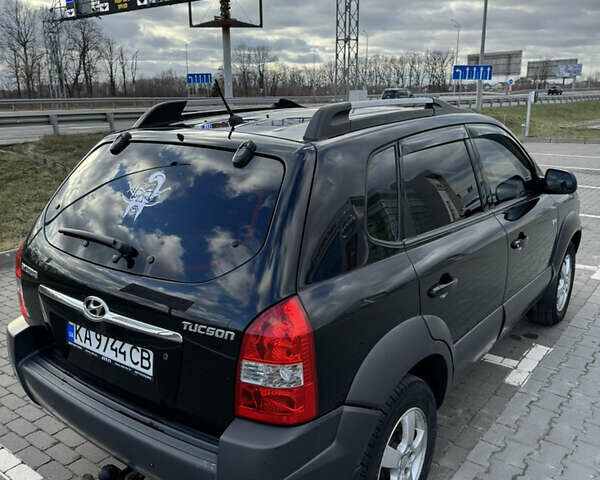 Чорний Хендай Туксон, об'ємом двигуна 1.98 л та пробігом 318 тис. км за 7399 $, фото 12 на Automoto.ua