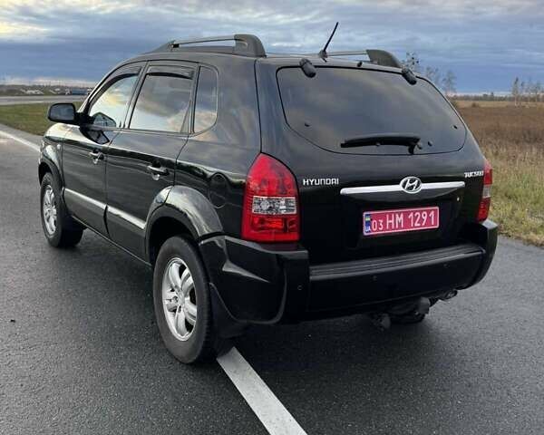 Черный Хендай Туксон, объемом двигателя 2 л и пробегом 253 тыс. км за 8299 $, фото 11 на Automoto.ua