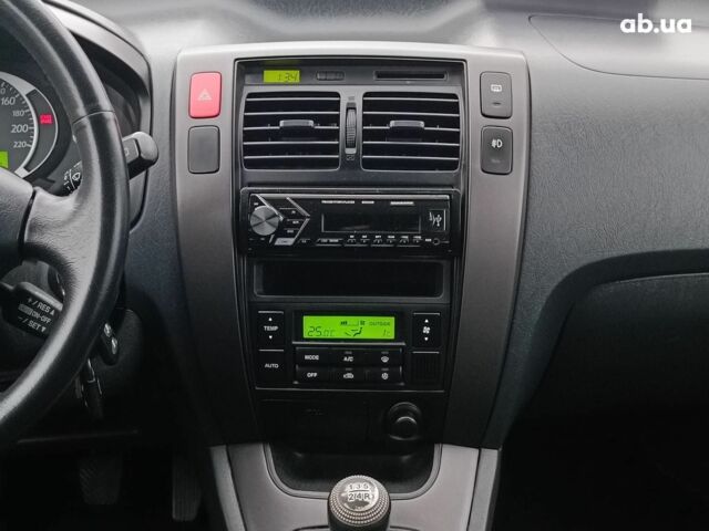 Чорний Хендай Туксон, об'ємом двигуна 2 л та пробігом 192 тис. км за 7990 $, фото 15 на Automoto.ua