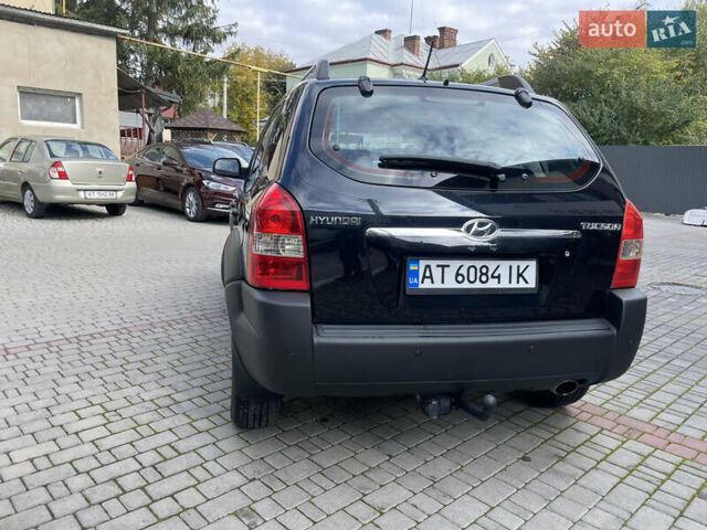 Черный Хендай Туксон, объемом двигателя 1.98 л и пробегом 177 тыс. км за 7600 $, фото 11 на Automoto.ua
