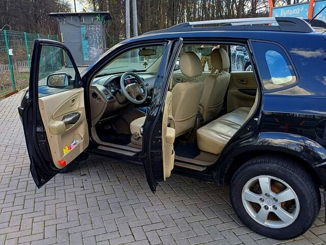 Чорний Хендай Туксон, об'ємом двигуна 2 л та пробігом 360 тис. км за 7800 $, фото 9 на Automoto.ua