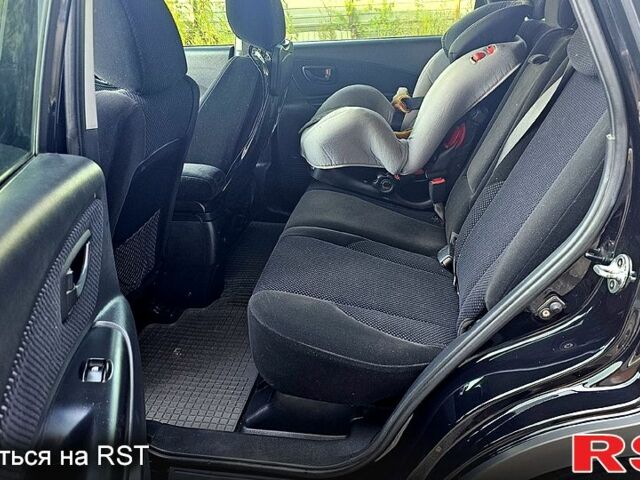 Черный Хендай Туксон, объемом двигателя 2 л и пробегом 215 тыс. км за 8350 $, фото 3 на Automoto.ua