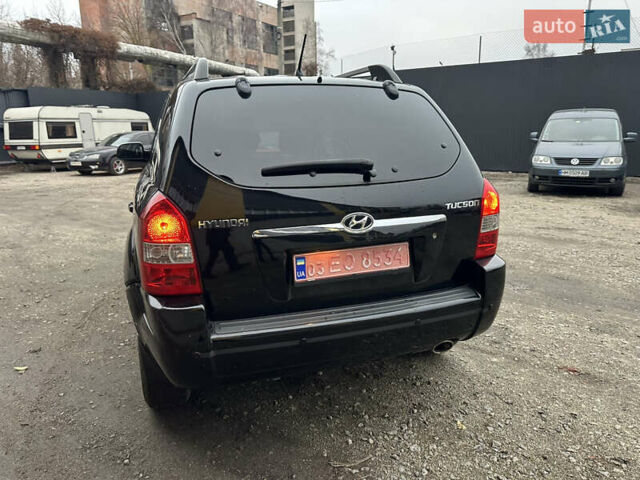 Чорний Хендай Туксон, об'ємом двигуна 2 л та пробігом 243 тис. км за 7999 $, фото 14 на Automoto.ua