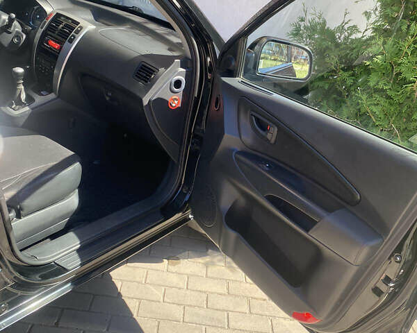 Чорний Хендай Туксон, об'ємом двигуна 1.99 л та пробігом 230 тис. км за 8000 $, фото 9 на Automoto.ua