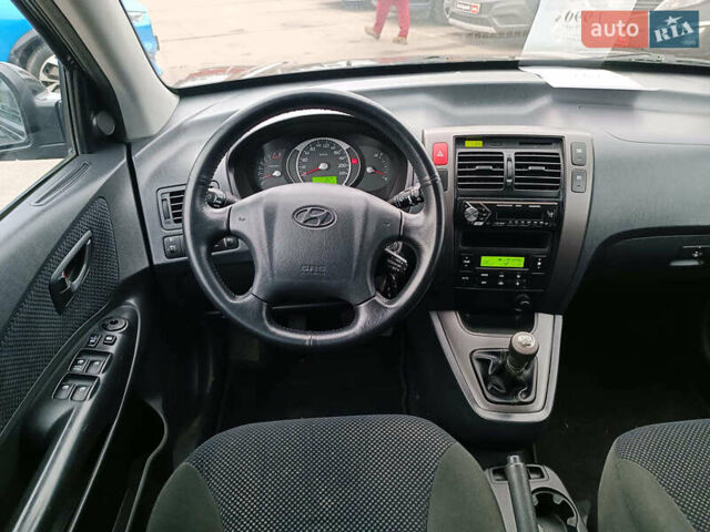 Черный Хендай Туксон, объемом двигателя 2 л и пробегом 192 тыс. км за 7990 $, фото 14 на Automoto.ua