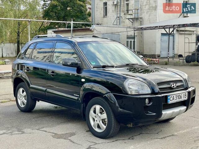 Черный Хендай Туксон, объемом двигателя 1.98 л и пробегом 172 тыс. км за 8500 $, фото 3 на Automoto.ua