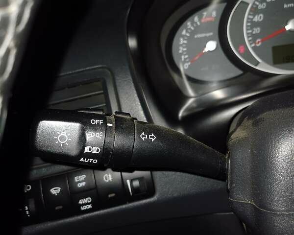 Черный Хендай Туксон, объемом двигателя 1.98 л и пробегом 189 тыс. км за 7800 $, фото 1 на Automoto.ua