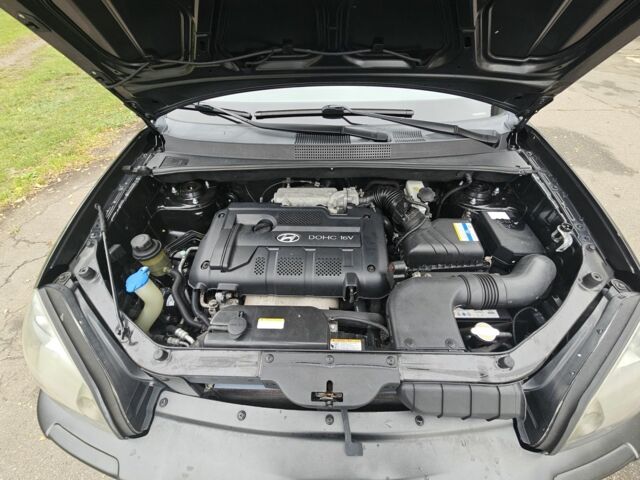 Чорний Хендай Туксон, об'ємом двигуна 2 л та пробігом 186 тис. км за 8300 $, фото 20 на Automoto.ua