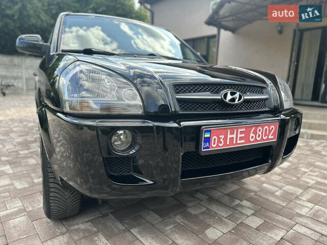 Черный Хендай Туксон, объемом двигателя 2 л и пробегом 218 тыс. км за 8700 $, фото 2 на Automoto.ua