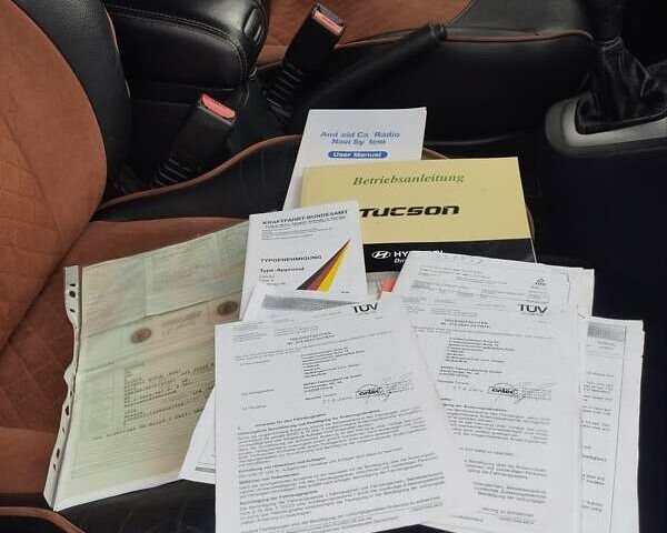 Черный Хендай Туксон, объемом двигателя 1.98 л и пробегом 214 тыс. км за 7700 $, фото 37 на Automoto.ua