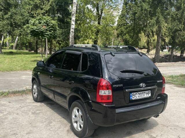 Черный Хендай Туксон, объемом двигателя 2 л и пробегом 171 тыс. км за 8500 $, фото 6 на Automoto.ua