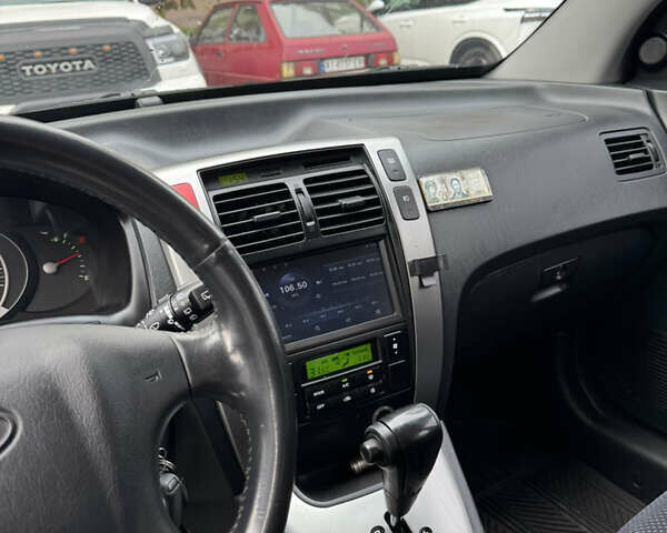 Черный Хендай Туксон, объемом двигателя 2 л и пробегом 157 тыс. км за 8900 $, фото 29 на Automoto.ua