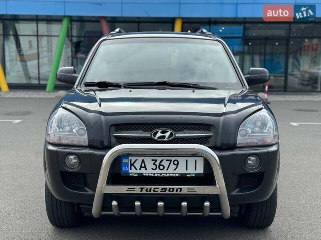 Черный Хендай Туксон, объемом двигателя 1.98 л и пробегом 202 тыс. км за 8350 $, фото 3 на Automoto.ua