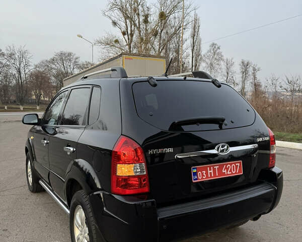 Черный Хендай Туксон, объемом двигателя 2 л и пробегом 210 тыс. км за 7850 $, фото 14 на Automoto.ua