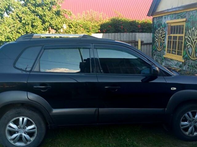 Черный Хендай Туксон, объемом двигателя 2 л и пробегом 0 тыс. км за 7500 $, фото 1 на Automoto.ua