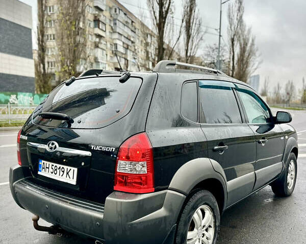 Чорний Хендай Туксон, об'ємом двигуна 1.98 л та пробігом 238 тис. км за 8499 $, фото 10 на Automoto.ua
