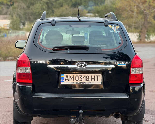 Черный Хендай Туксон, объемом двигателя 2 л и пробегом 361 тыс. км за 6499 $, фото 4 на Automoto.ua