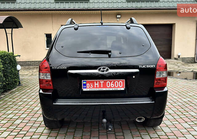 Чорний Хендай Туксон, об'ємом двигуна 2 л та пробігом 182 тис. км за 8299 $, фото 12 на Automoto.ua