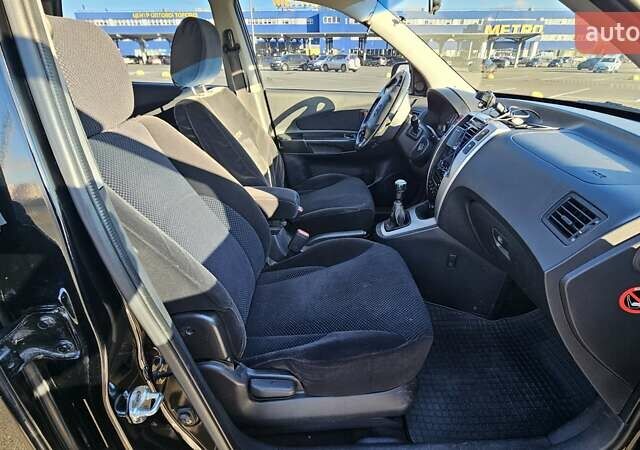 Чорний Хендай Туксон, об'ємом двигуна 1.98 л та пробігом 212 тис. км за 7766 $, фото 12 на Automoto.ua