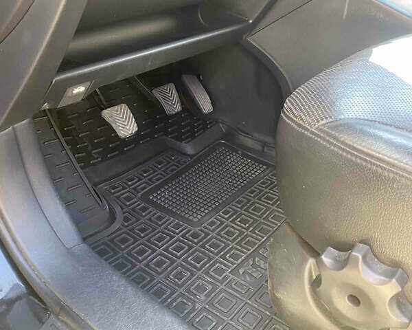 Чорний Хендай Туксон, об'ємом двигуна 1.99 л та пробігом 230 тис. км за 8000 $, фото 13 на Automoto.ua