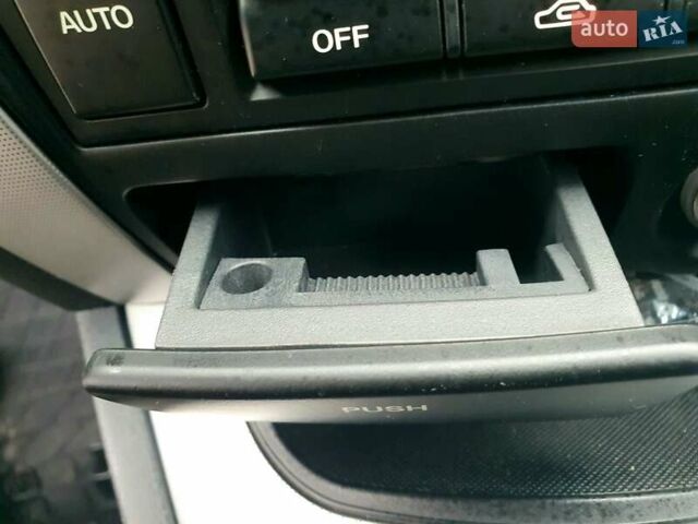 Чорний Хендай Туксон, об'ємом двигуна 2 л та пробігом 225 тис. км за 8000 $, фото 49 на Automoto.ua